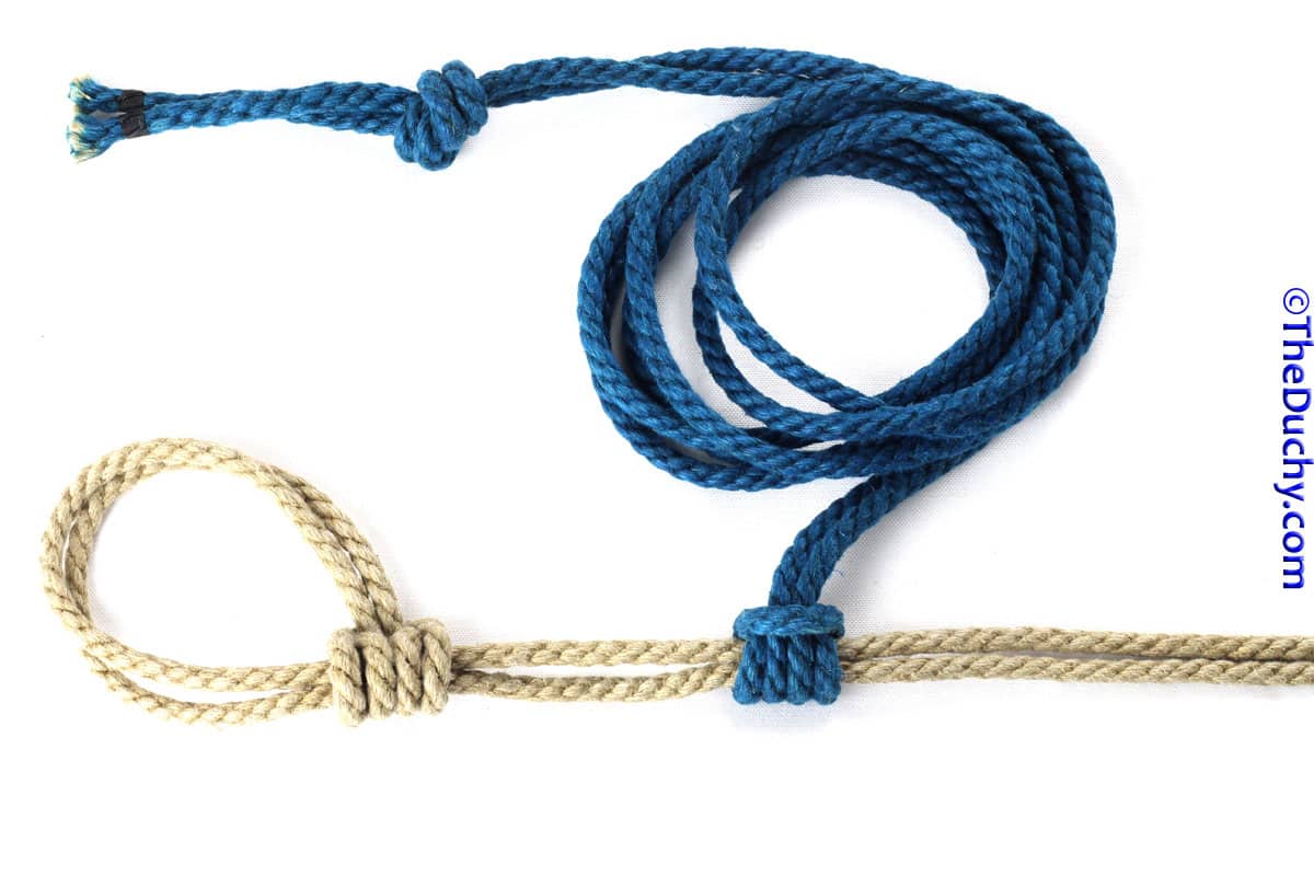 Prusik Anchor — three wraps of blue cord around a doubled tan line, tail through the barrel